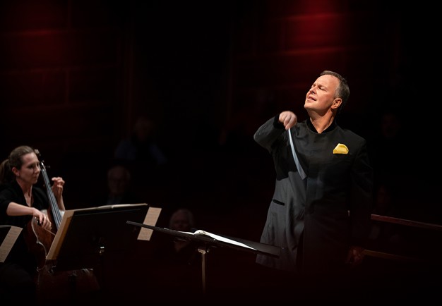 Man leading the orchestra. Photography