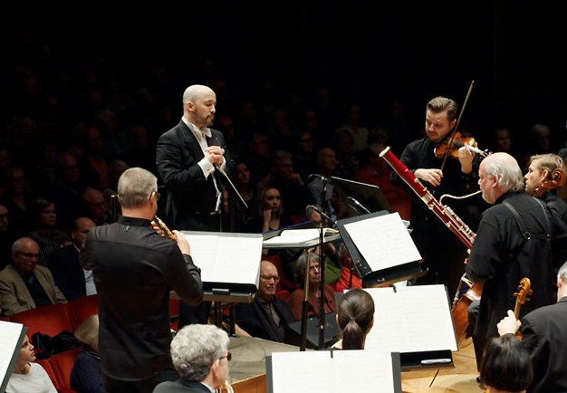 Man with grey hair conducting. From the concert.