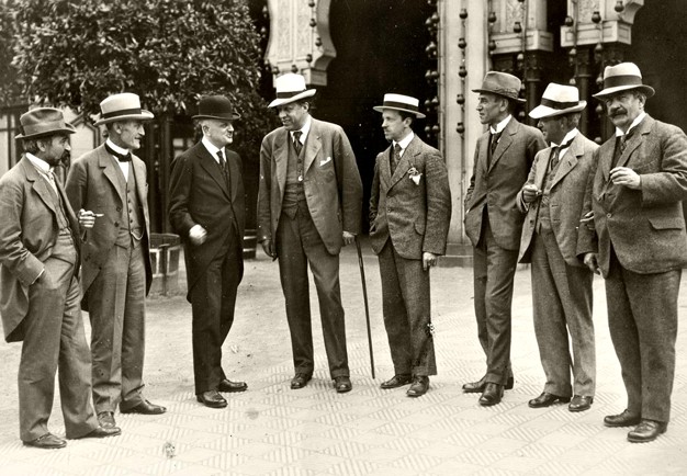 Men lined up. Black and white photography.